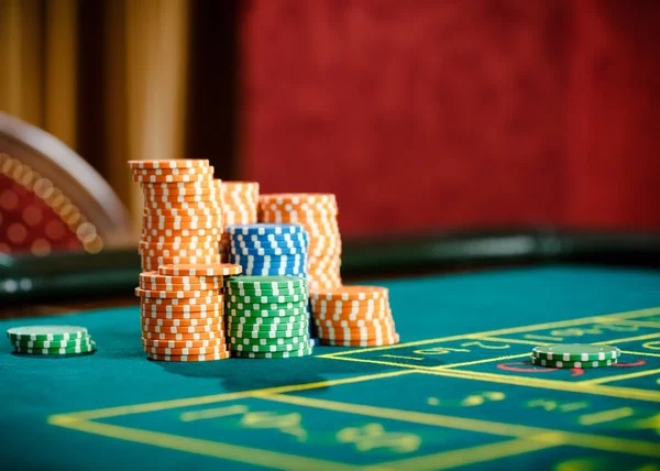 Live-dealer blackjack table with multi-camera studio setup on rajamuda login